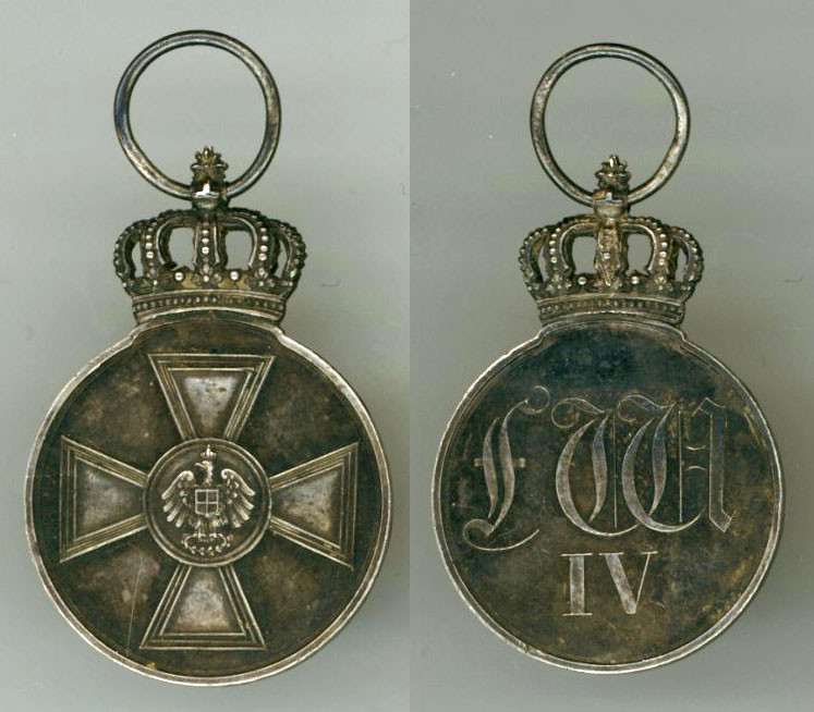 Fig 1: Medal 1st Type with Cypher "FW IV" on it's reverse
